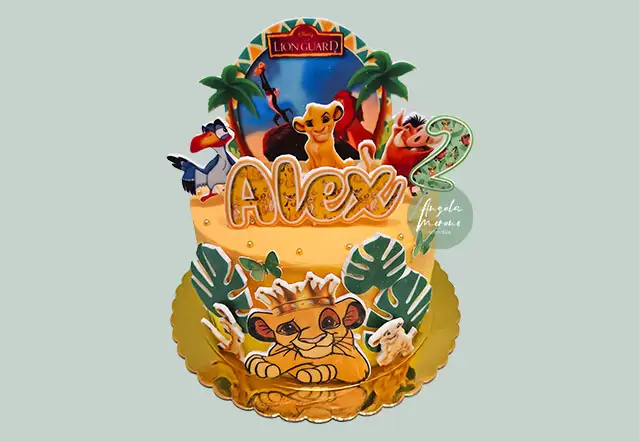 Tarta de Cumpleaños Mágica El Rey León - Angela Moreno Repostería, pasteles personalizados en Barcelona. Tarta personalizada El Rey León para cumpleaños en Barcelona, sin fondant, con Simba, Timón y Pumba. Angela Moreno Repostería, pasteles personalizados en Barcelona.
