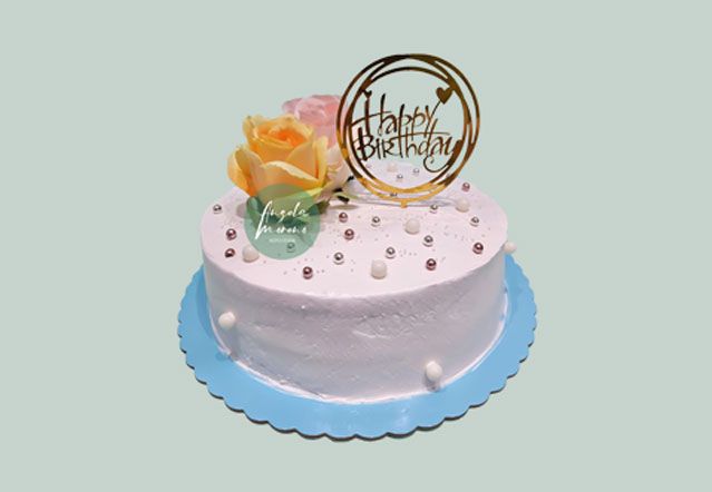 angela-moreno-reposteria-cafe-Barcelona_tarta-sencilla-vintage-decoracion-flor-amarilla-topper-no-comestible